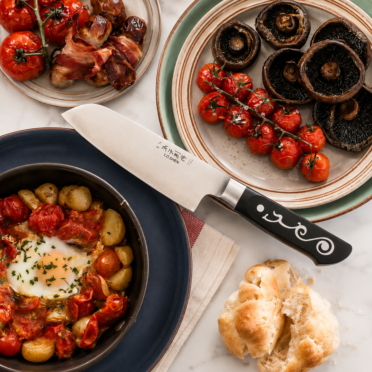 Overhead view of a dinner spread: roasted cherry tomatoes, bacon-wrapped bites, sautéed mushrooms, baked eggs in tomato sauce, and crusty bread.