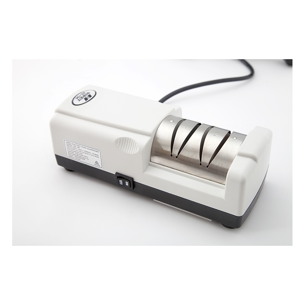 Small electric paper shredder with four exposed rotary blades and a side ON/OFF switch on a white base.