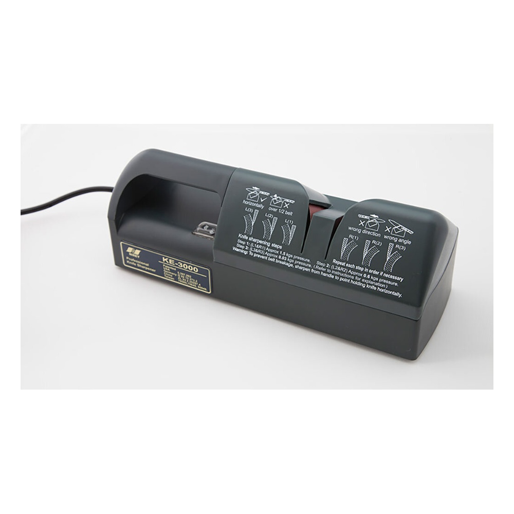 Electric knife sharpener with two sharpening slots and instruction labels, cord extending left.