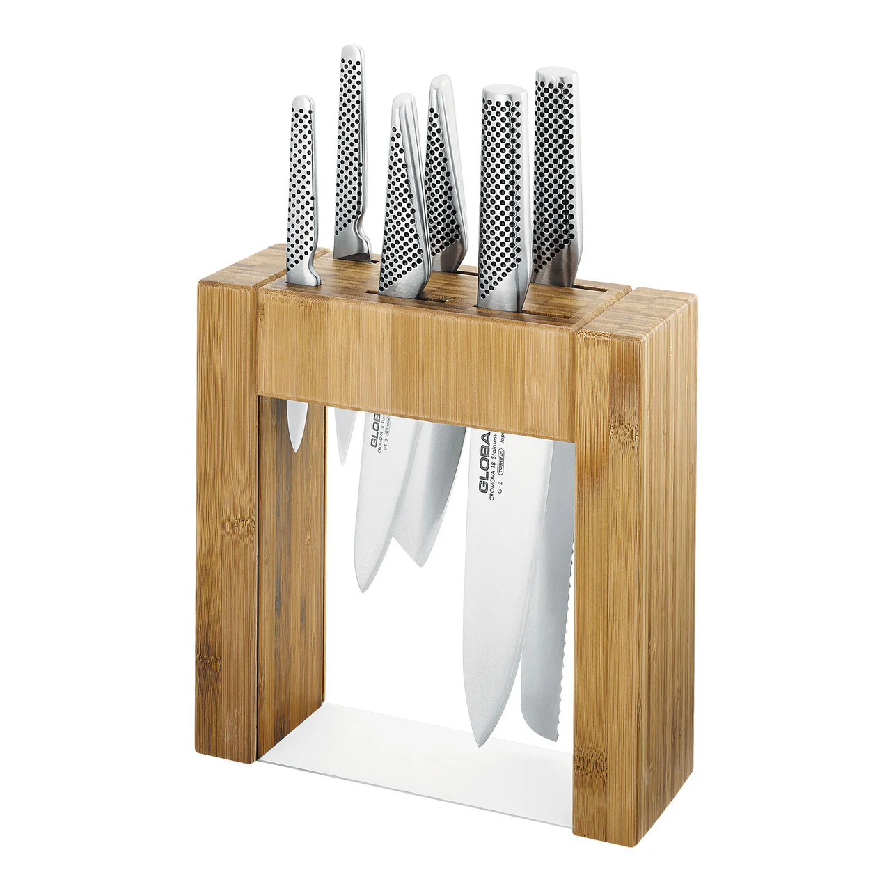 Wooden knife block holding multiple stainless steel chef knives with blades exposed downward